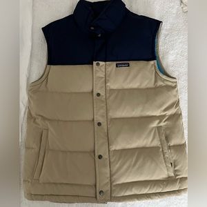 Men’s large puffer vest navy and tan with light blue lining like new